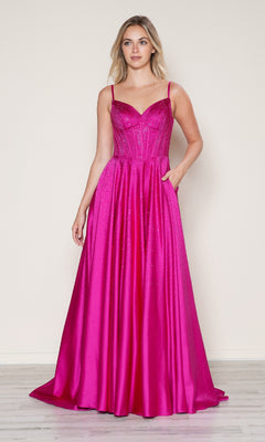 A woman models the Long Prom Dress: Poly USA 9610—an a-line, floor-length, bright pink gown with spaghetti straps and a fitted corset bodice—standing against a plain light background.