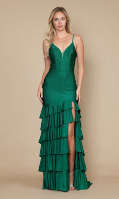 A woman poses against a beige background in the Strappy Long Ruffled Prom Dress: Poly USA 9620—a green, sleeveless evening gown with thin straps, open back, tiered ruffles, and a thigh-high slit.