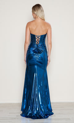 A woman faces away from the camera, modeling the Poly USA 9684 Lace-Up Strapless Long Prom Gown—a shiny blue metallic dress with a slight train—against a plain background.