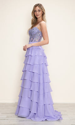 A woman stands sideways against a light background, wearing the Long Tiered Corset Prom Dress: Poly USA 9698 in lavender, featuring an A-line silhouette and corset-style bodice.