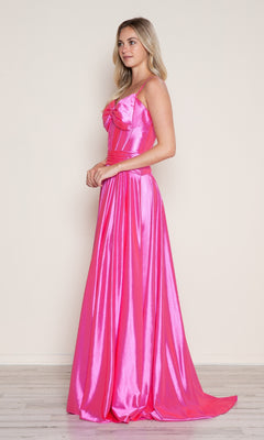 A woman stands in profile against a plain light background wearing the Bow-Front Long Corset Prom Dress: Poly USA 9702, a floor-length hot pink gown featuring a fitted bodice and flared A-line skirt.