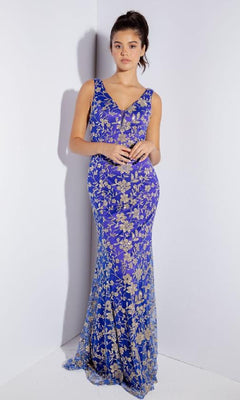 A woman stands against a white background wearing the Eureka 9706 Sequin-Print Long Prom Dress, a fitted, sleeveless royal blue gown with gold floral embroidery.