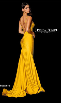 A woman poses with her back to the camera in a bright yellow, floor-length Jessica Angel 974 prom dress featuring an open back, thin straps, and a mermaid skirt. “Jessica Angel” and “Style: 974” appear on a black background.