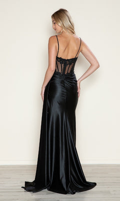 Wearing the Poly USA 9740 long prom dress, a woman stands facing away in a black satin gown with a sheer embroidered corset bodice and thin straps, the form-fitting silhouette flowing elegantly behind her.