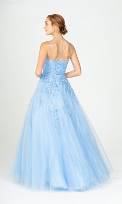 A woman stands facing away, wearing the Eureka CC0240 Lace-Up Long Lace Prom Ball Gown, featuring a fitted strappy bodice and a flowing embroidered tulle skirt in light blue.