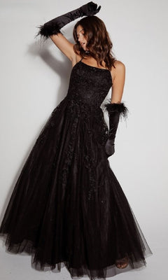 A woman models the Eureka CC0240 Lace-Up Long Lace Prom Ball Gown, featuring elegant lace details and a flattering silhouette, paired with feathered gloves, against a plain white background.
