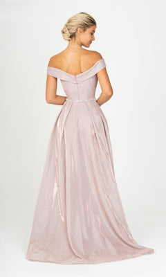 A woman faces away, wearing the Eureka 9808 Off-Shoulder Long Glitter Prom Dress in pale pink with a fitted bodice and flowing skirt, set against a plain white background.