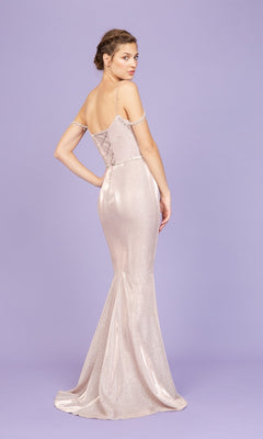 Woman wearing the Long Prom Dress: Eureka 9811, a sparkly light pink mermaid gown with thin straps and lace-up back, poses on a lavender background.