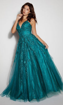 A woman models the Eureka 9858, an embroidered-lace long prom dress with floral details and a tulle skirt, in teal, standing against a plain light background.