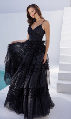 A woman in the Lace-Up Long Glitter-Tulle Prom Dress: Eureka 9888 stands by a white staircase and pool, wearing the sleeveless, tiered black gown and holding part of her dress with one hand.