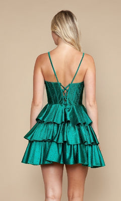 A woman is seen from behind wearing the Poly USA 9894 Ruffle Short Corset Hoco Dress in green, featuring tiered ruffles and a lace-up back.