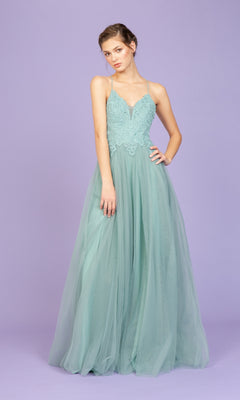 A woman wears the Lace-Bodice Long Glitter Prom Dress: Eureka 9902, a light teal, floor-length gown with lace bodice, tulle skirt, and thin straps, posing against a plain lavender background.
