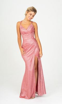 Woman wearing Long Prom Dress: Eureka 9933 in ruby red glitter jersey with a thigh-high slit, standing and smiling against a plain white background.