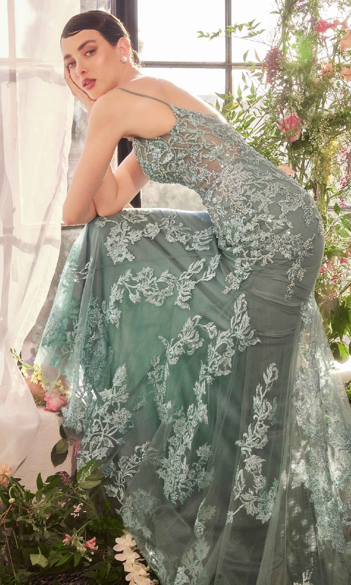 A woman wearing the Andrea & Leo A1421 Beaded-Lace Long Prom Dress.
