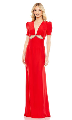 A woman wears the Mac Duggal 2630, a short-sleeve long formal dress in red featuring a plunging neckline, midriff cutout, and rhinestone accents.