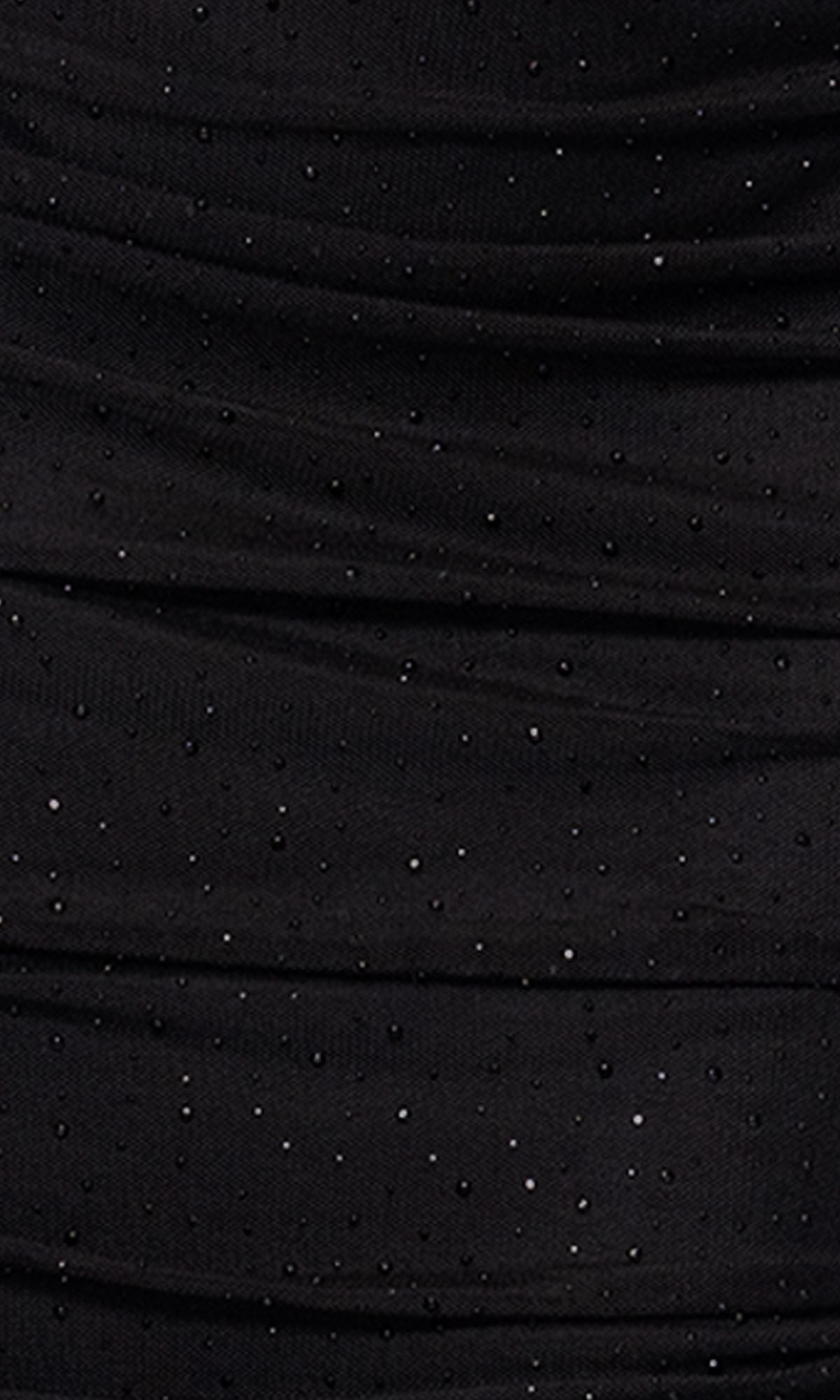 Close-up of the Betsy & Adam A26893 Strapless Black Prom Gown, featuring sparkling beaded dots on black fabric with gentle horizontal ruching.