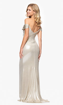 Woman in a Champagne Long Formal Dress by Betsy & Adam (style A26921) poses backward, looking over her shoulder and smiling, set against a plain white background.