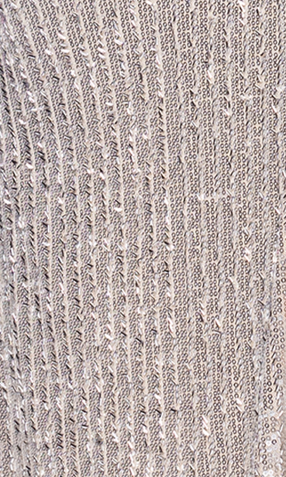 Close-up of textured, ribbed silver fabric with vertical lines and a subtle shimmer—elegant details featured in the Betsy & Adam Long Champagne Prom Dress (A26952).