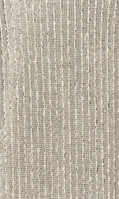 Close-up of the Betsy and Adam A27009 Long Formal Dress's beige fabric, featuring vertical rows of small, sequin-like embellishments that create a shimmery, textured pattern.
