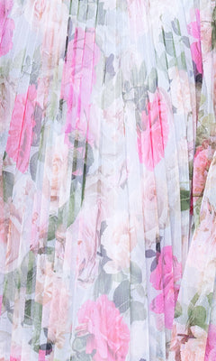 Close-up of the Betsy & Adam A27054 Print Wedding Guest Dress fabric, showcasing pink and white floral roses and green leaves in a pleated party dress style.