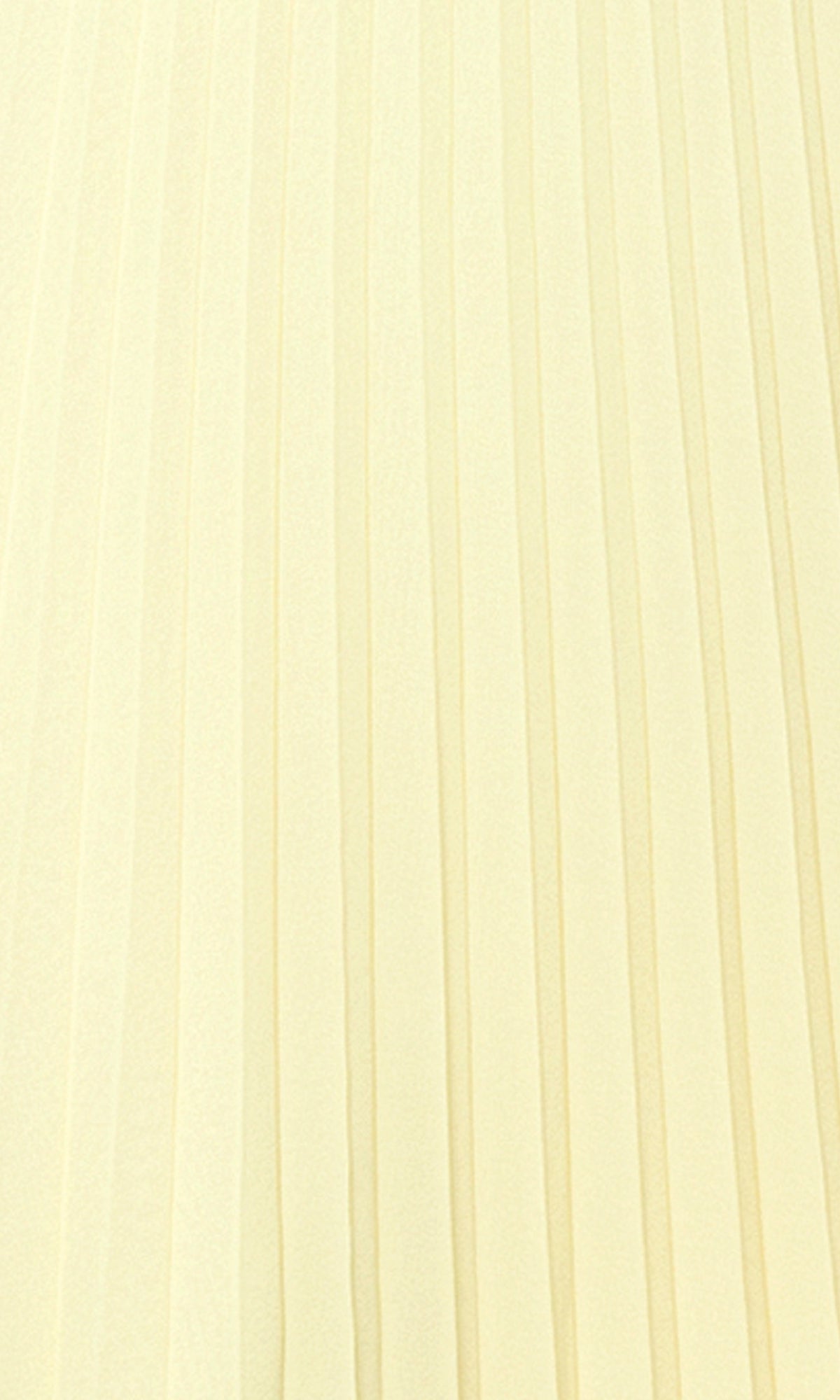 Close-up of the Betsy & Adam A27098 strapless wedding guest dress, featuring pleated, light cream-colored fabric with elegant vertical folds.