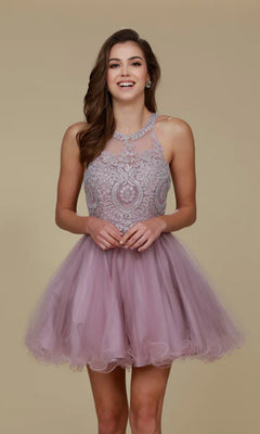 A woman smiles at the camera, wearing the Short Babydoll Homecoming Dress with Beading—sleeveless, lilac, a-line style featuring intricate beadwork on the bodice—standing against a plain beige background.