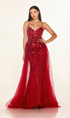 A woman poses in the Cecilia Couture C132 long prom dress—sleeveless, floor-length, red and sparkly with sequin and mesh details plus a dramatic tulle overskirt—against a plain light background.