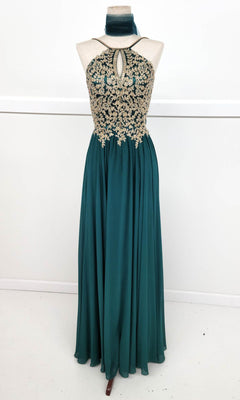 The Chicas C1521 high-neck long A-line prom dress features a teal color, golden lace embroidery bodice, keyhole cutout, flowing skirt, and comes with a matching choker. Displayed on a dress form.