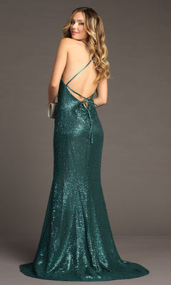 Wearing the Lace-Up Long Sequin Prom Dress: Chicas C2402 in green, a person stands facing away to highlight the gown’s crisscross straps and open back, with long, wavy hair flowing down.