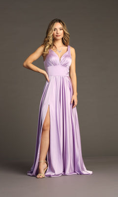 A woman stands against a plain gray background wearing the Empire-Waist Long A-Line Prom Dress: Chicas C242, a sleeveless lavender gown with a high slit that exudes elegance and sophistication for any special occasion.
