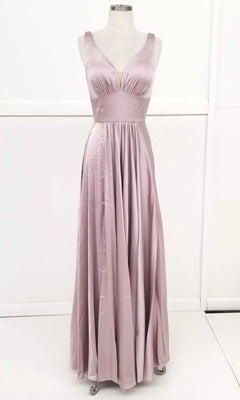 The Chicas C242 Empire-Waist Long A-Line Prom Dress features a sleeveless, floor-length light mauve satin design with a fitted bodice, V-neckline, and wide waistband, shown on a mannequin against a white background.