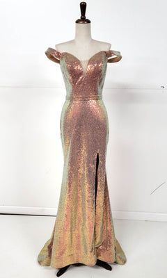 The Off-Shoulder Long Sequin Prom Dress: Chicas C324, featuring a deep V neckline, fitted waist, front slit, and iridescent sequin fabric, is displayed on a dress form.