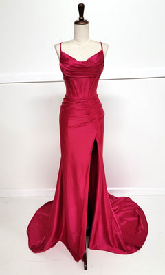 The Cowl-Neck Long Prom Dress: Chicas C326, a deep pink satin gown with spaghetti straps, ruched bodice, high front slit, and slight train, is displayed on a dress form against a white background.