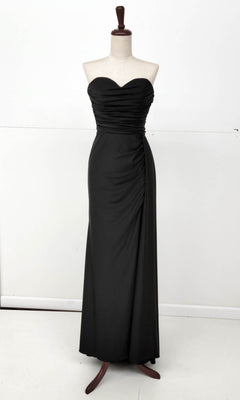 The Chicas C327 Side-Sash Strapless Long Prom Dress in black, with a sweetheart bodice and ruched details, is elegantly displayed on a dress form against a plain white background.