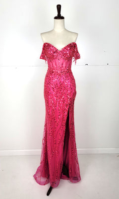 A mannequin showcases the Chicas C331 Off-Shoulder Long Sequin Prom Dress in hot pink with a front slit, set against a plain white background—an eye-catching evening gown ideal for formal events.
