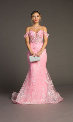 A woman in the Off-Shoulder Long Butterfly Prom Dress: Chicas C332, a pink gown with lace details, holds a silver clutch while standing against a plain gray background.