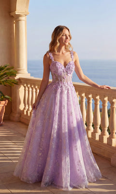 A woman in the Lavender Long Prom Dress: Chicas C370 stands on a columned balcony, overlooking a calm blue sea.