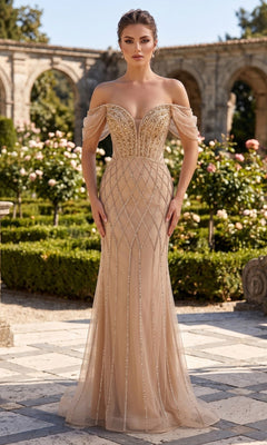 A woman in the Chicas C390 long formal dress in champagne/gold, featuring an off-the-shoulder beaded bodice, stands in a formal garden framed by stone arches and blooming roses.