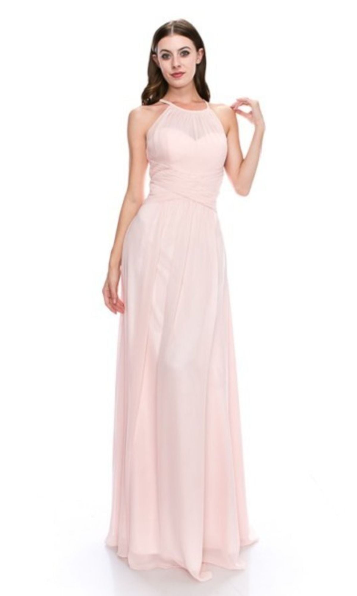 A woman models the Chicas C5150 High-Neck Long A-Line Prom Dress in light pink, featuring a sleeveless halter neckline—an elegant and affordable choice for formal events.