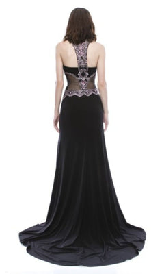 A woman stands facing away on a white background, wearing the Chicas C6025 high-neck long black prom dress with a lace-up back and decorative embellishments.