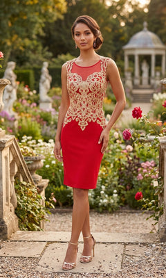 A woman stands outdoors in a garden, surrounded by flowers and stone steps, wearing the Chicas C7532 short semi-formal dress in red and gold; a gazebo is visible in the background.