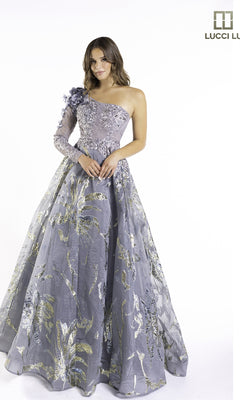 A woman models the Lucci Lu C8054 long prom dress—a lavender lace one-shoulder gown with floral embroidery and metallic accents—against a white background.