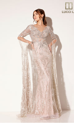 A woman poses in the Lucci Lu C8073 long formal dress, featuring pastel pink lace, silver beading, and floor-length sheer sleeves. The LUCCI LU logo is in the top right corner.