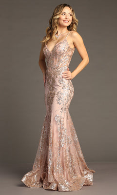 Woman wearing the Chicas C813 Long Glitter-Print Prom Dress, a sleeveless, floor-length light pink mermaid gown with silver and gold sequin embellishments, standing against a plain background.