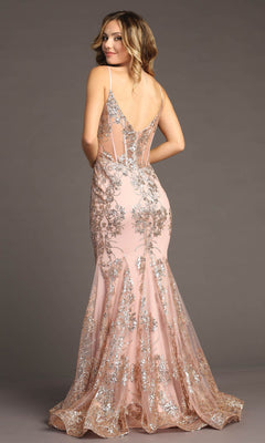 A woman poses with her back to the camera in the Chicas C813 Long Glitter-Print Prom Dress, a floor-length blush pink mermaid gown featuring silver floral sequins and sheer side panels.