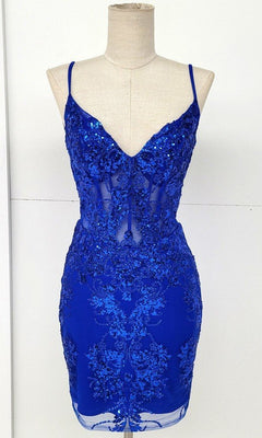 A mannequin showcases the Sheer-Corset Short Glitter Homecoming Dress C814, featuring a fitted sleeveless blue design with thin straps, sequin details, and sheer panel accents.