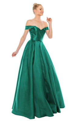 A woman wears the Chicas C9197, an off-the-shoulder, floor-length emerald green prom ball gown featuring a lace-up back, fitted bodice, and full skirt.