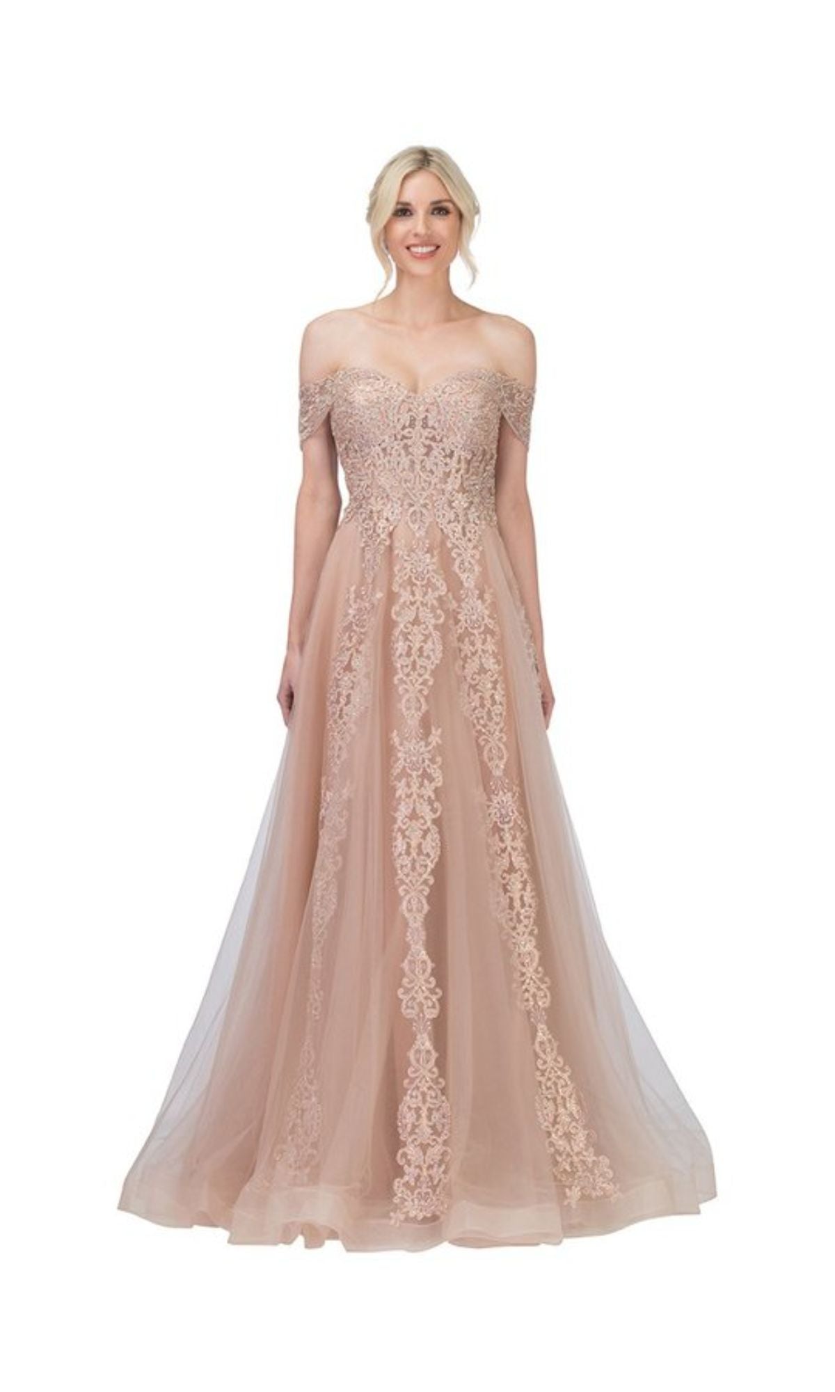 A woman in the Long Lace Prom Ball Gown: Chicas CA1103, a blush pink off-the-shoulder dress with delicate lace detailing, stands against a plain white background.