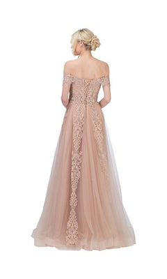 A woman models the Long Lace Prom Ball Gown: Chicas CA1103 in blush pink, featuring an off-the-shoulder lace design with delicate detailing, viewed from the back against a white background.