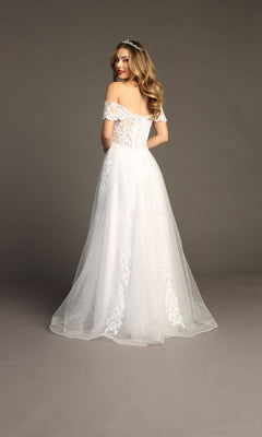Woman wearing the Chicas CA1103 Long Lace Prom Ball Gown with an off-the-shoulder design and flowing tulle skirt, standing with her back to the camera against a plain backdrop.